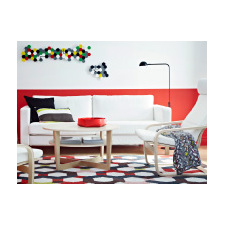 White two-seat sofa and armchair with round coffee table in oak veneer