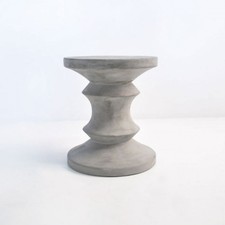 round concrete stool or side table
