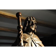 A BEAUTIFUL EARLY 16TH CENTURY ENGLISH OAK DEVOTIONAL SCULPTURE OF ST ROCH. MOST PROBABLY BURY ST EDMUNDS. CIRCA 1520.