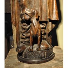 A BEAUTIFUL EARLY 16TH CENTURY ENGLISH OAK DEVOTIONAL SCULPTURE OF ST ROCH. MOST PROBABLY BURY ST EDMUNDS. CIRCA 1520.