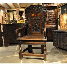 A WONDERFUL CHARLES II YORKSHIRE OAK AND INLAID WAINSCOT ARMCHAIR. CIRCA 1670.