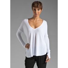FEEL THE PIECE Robin Thermal Flowy Top with Thumb Holes in White at Revolve Clothing - Free Shipping!