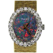 Piaget Yellow Gold Petite Opal Dial Diamond Bezel Quartz Wristwatch 