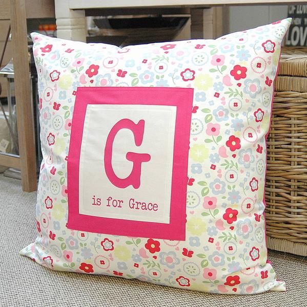 Giant name cushion with fir...