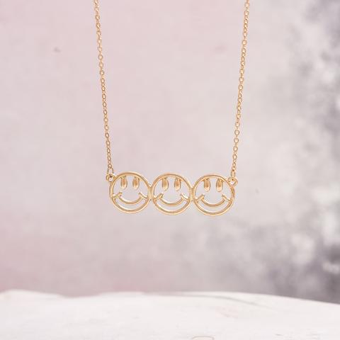 emoji smiley necklace gold