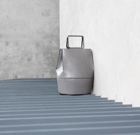leather bag with metal handle