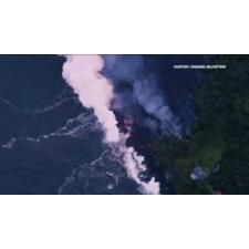 Lava flow meets the sea on Kilauea sending up plumes of toxic vog.